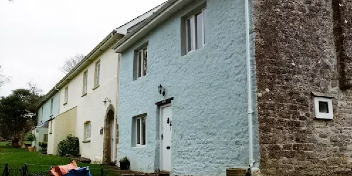 Building exterior painting with professional paint finish